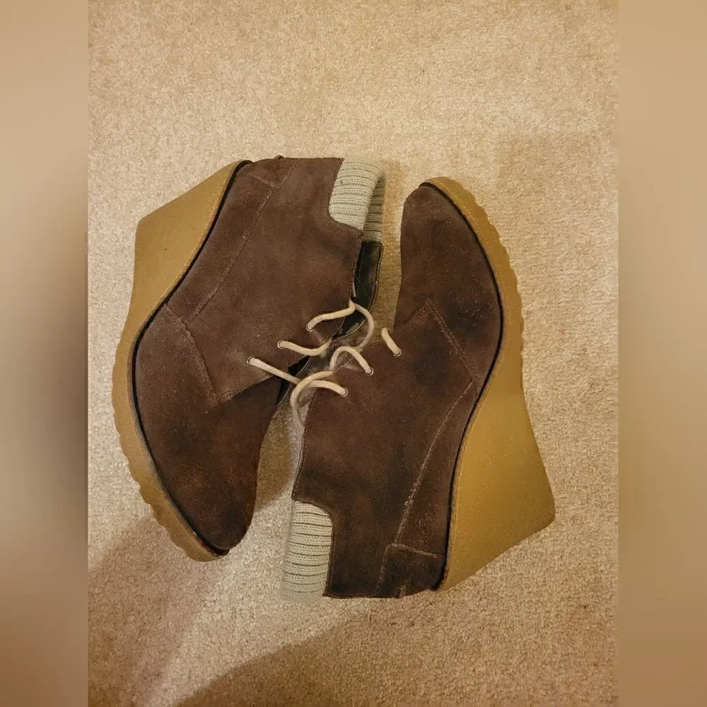 Lacoste suede wedge boot.